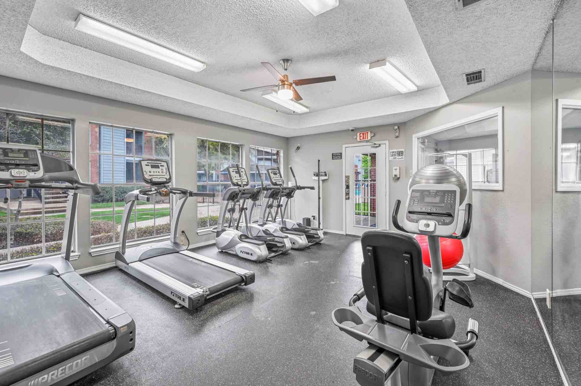 Fitness center with sitting bike, treadmills and elliptical machines